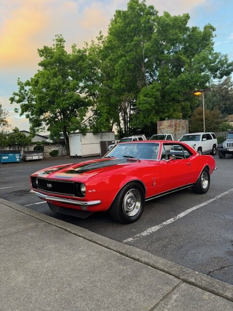 Red classic Camaro parked at Rohnert Park Transmission