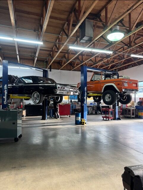 Classic vehicles inside the Rohnert Park Transmission service bay