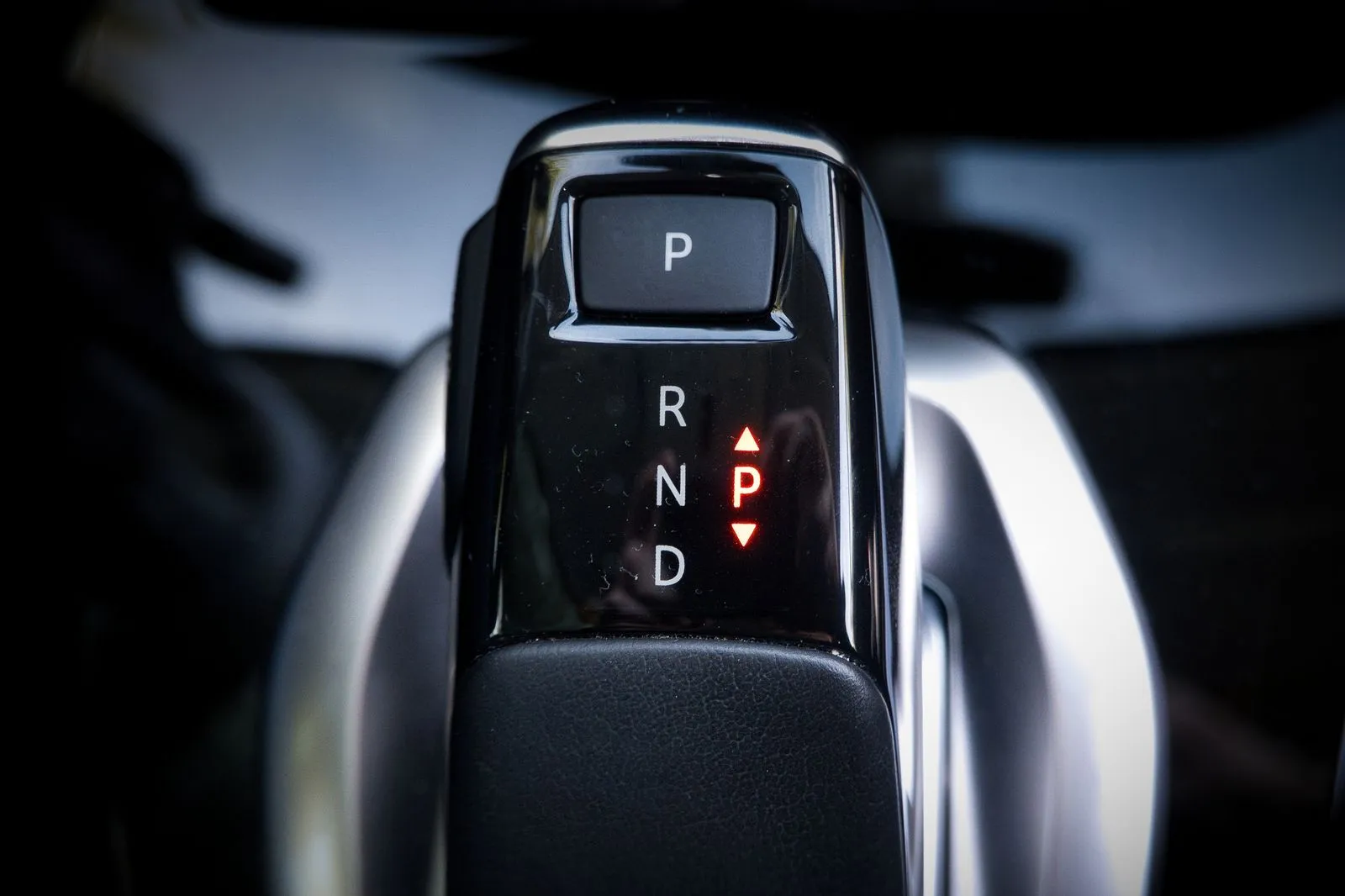 Close-up of an automatic gear selector showing P, R, N and D with the P indicator lit